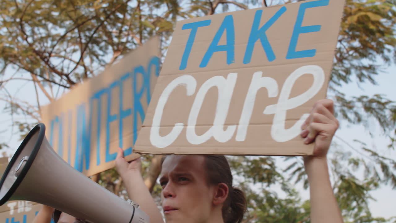 Multicultural Students with Placards Asking to Save Planet