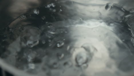 hot boiling water in stainless steel pot