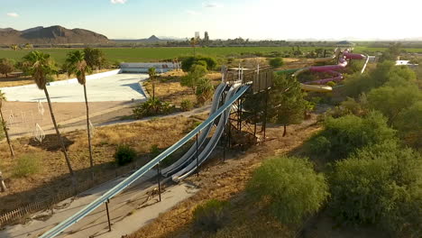 Wide drone shot of abandoned waterpark Breakers in Tucson Arizona