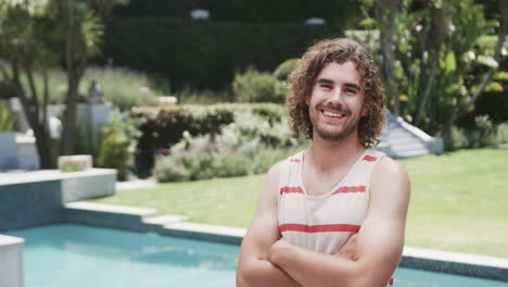 Young-Caucasian-man-stands-confidently-outdoors,-with-copy-space