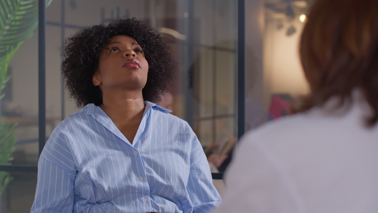 Worried Woman Being Given Bad News On Test Results By Doctor Or Oncologist At Meeting In Treatment Clinic For Breast Cancer In Hospital 2