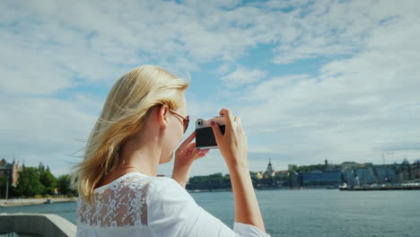 A-Young-Tourist-Photographs-Beautiful-Views-Of-Stockholm-With-A-Retro-Camera