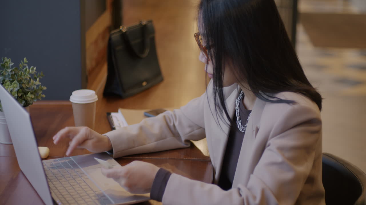 Woman Working in a Coffee Shop