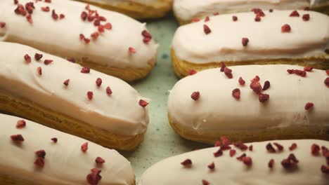 pink icing eclairs with raspberry sprinkles