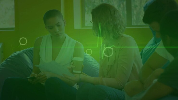 Animation of cardiograph over diverse business people talking