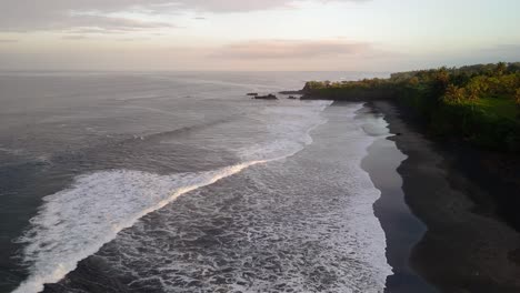 balian surfers beach, waves in motion along the shoreline during sunrise