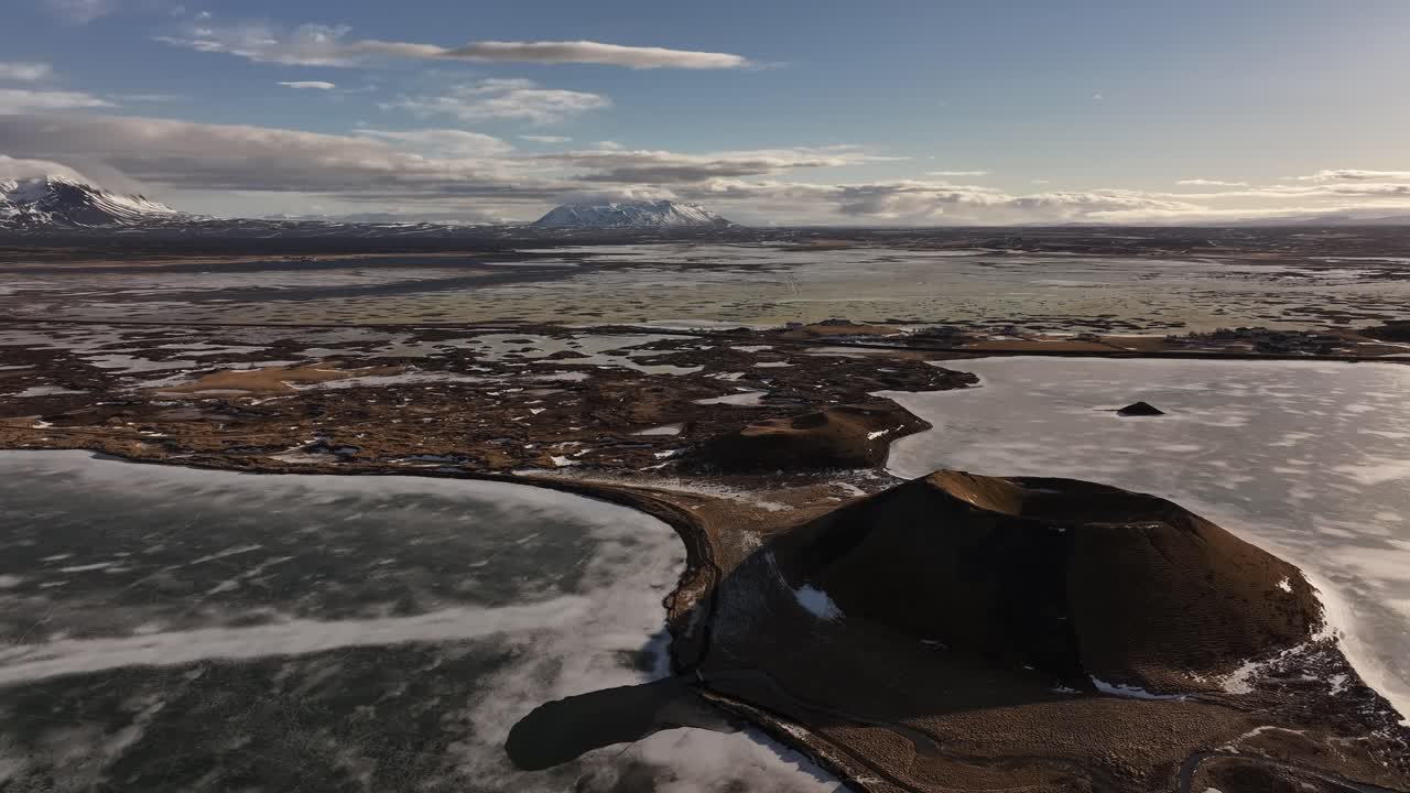 Crater Islands On A Frozen Mývatn Near Skútustaðir, Iceland - Aerial Drone Shot
