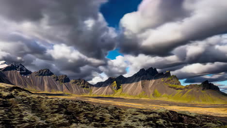 icelandic mountain landscape under dramatic clouds