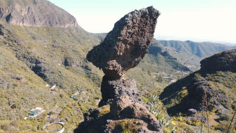 Fantastic-aerial-shot-in-orbit-of-Roque-de-la-Vela-on-the-island-of-Gran-Canaria,-in-the-city-of-Valsequillo-and-on-a-sunny-day