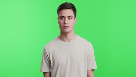 man in profile view on green screen