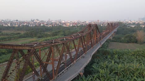 - vehicles running on long bien bridge - hanoi