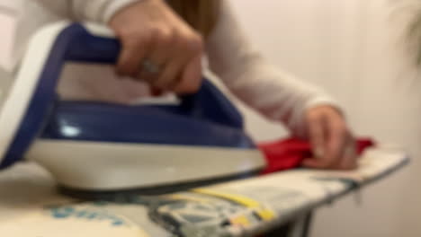 blurred image of slow-motion ironing