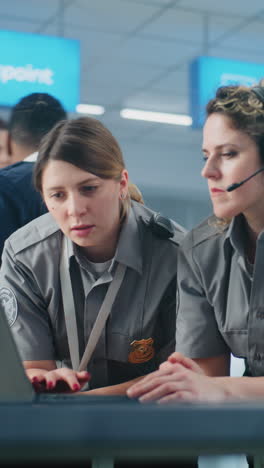 airport security officers collaborating
