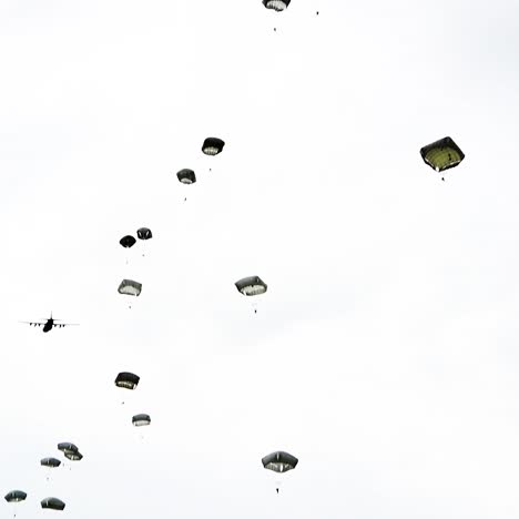 Paratroopers As they Jump Out Of A World War Ii Era Plane Near Saintemereeglise France For the 75th Commemoration Of Dday June 9th 2019