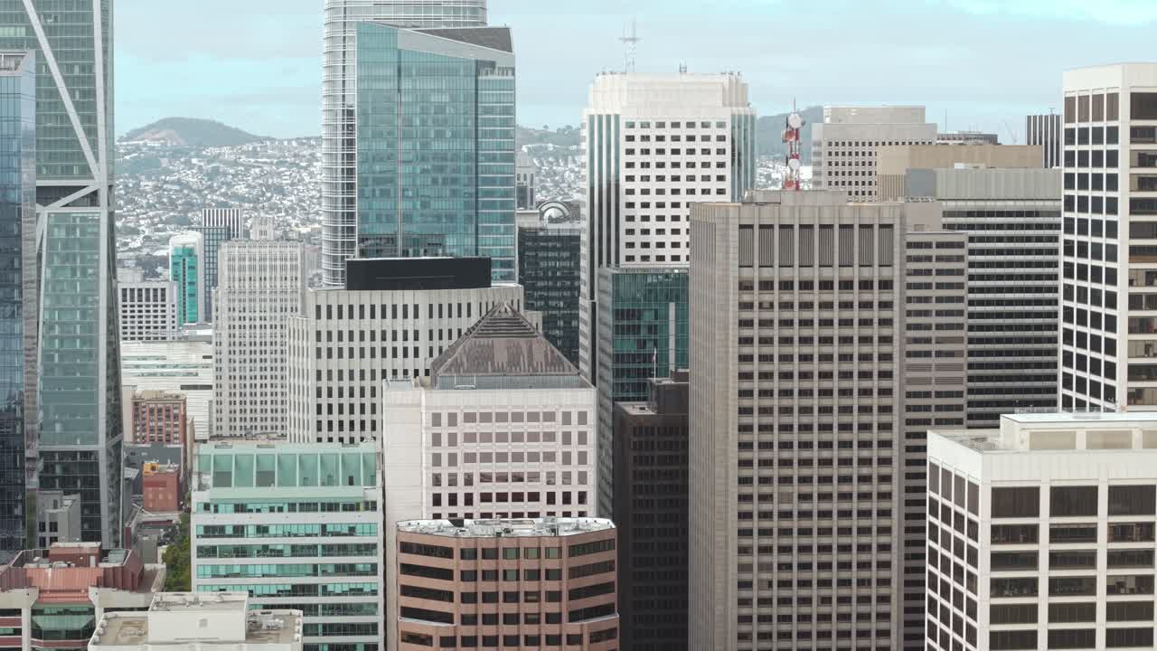 Drone Shot of Downtown San Francisco Buildings, Financial District Skyscrapers and Salesforce Park, California USA