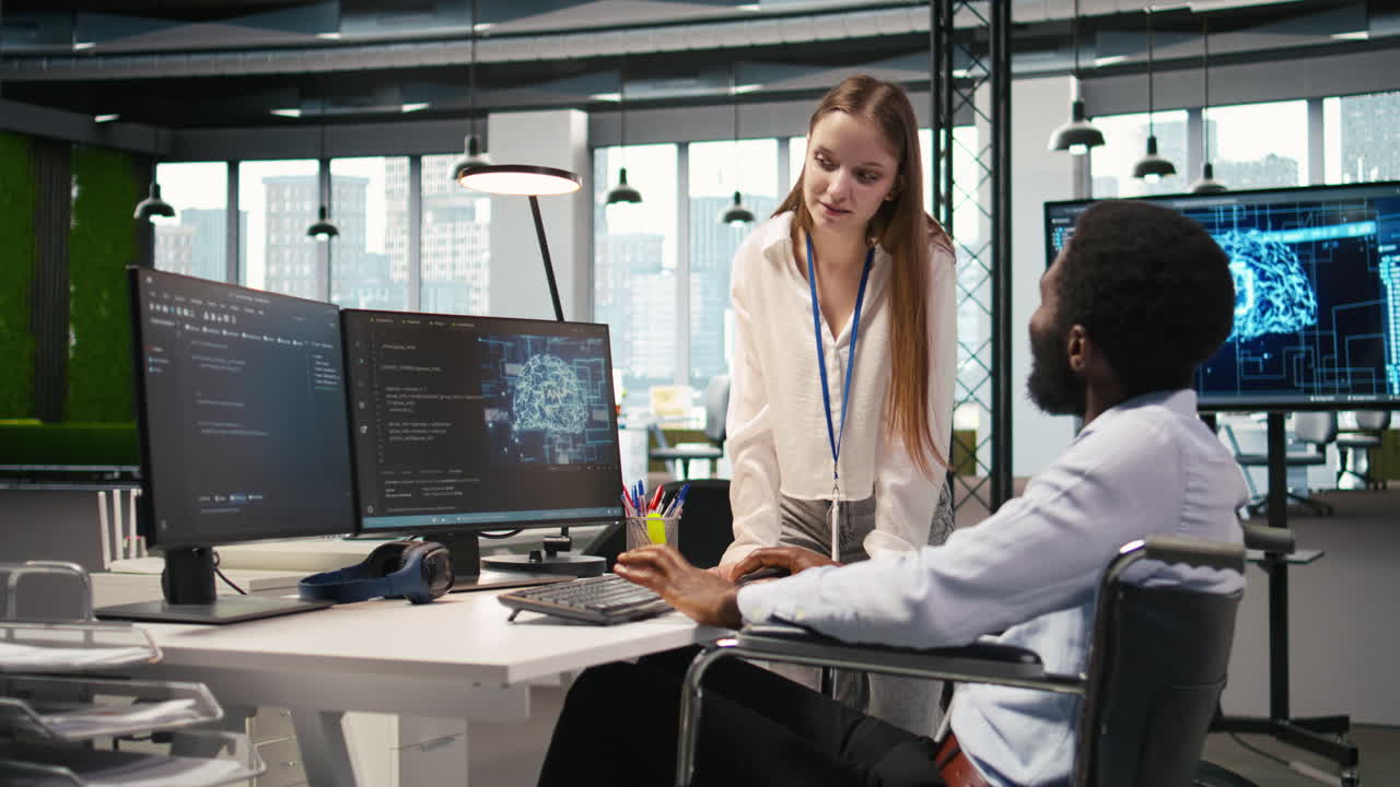 Young Engineer And Coworker With Paraplegia Using Ai, Doing Brainstorming