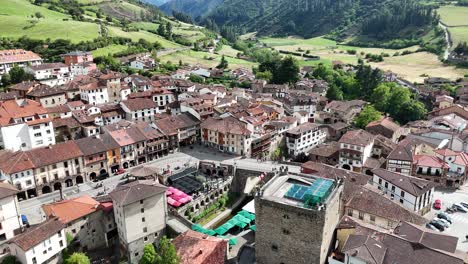 aerial view of a charming european town nestled in a green valley