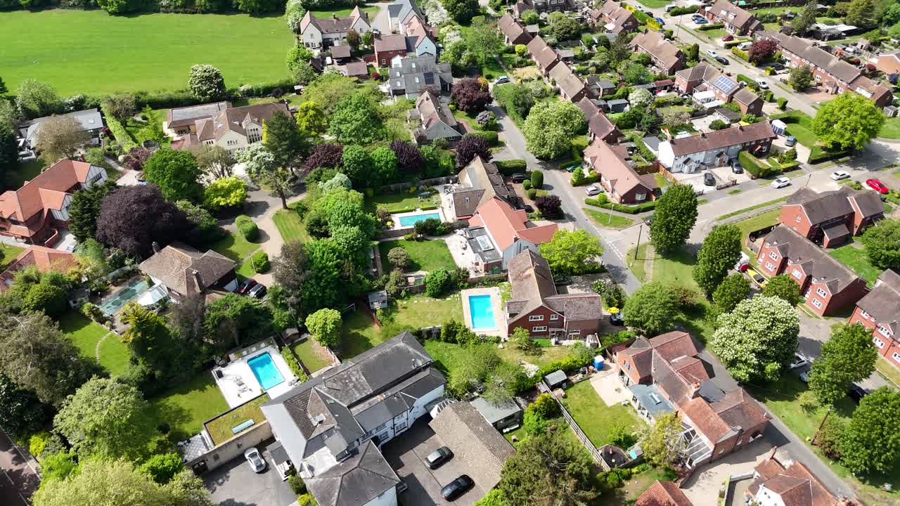 House with Swimming pools Stock Village in Essex UK drone,aerial