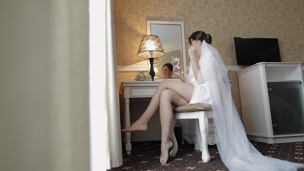 Beautiful bride getting ready for her wedding day