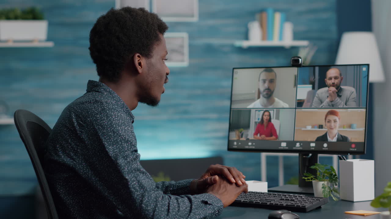 Selective focus on african american man on online conference video call