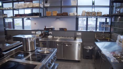 slow pan over empty restaurant kitchen