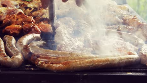 grilled sausage on the flaming grill