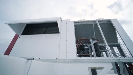 the air conditioning and ventilation system of a large industrial facility is located on the roof. it includes an air conditioner, smoke exhaust, and ventilation.