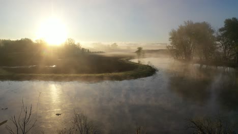 misty sunrise over a river