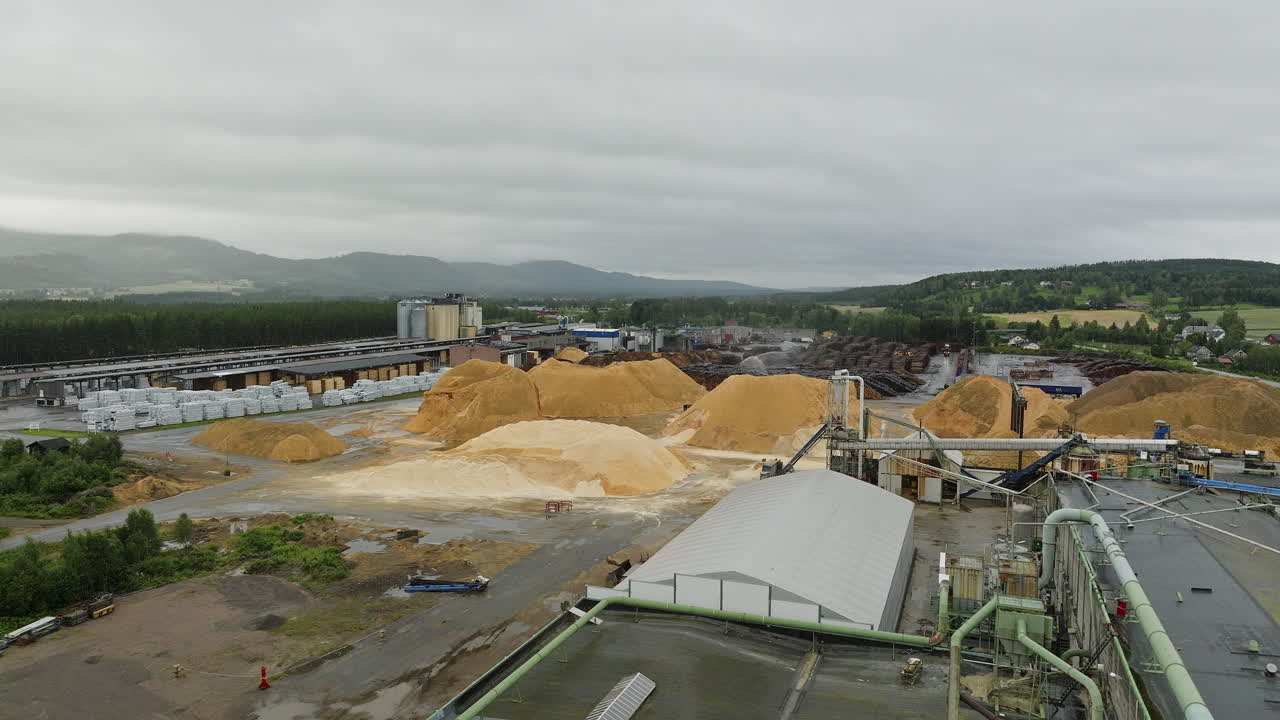 Commercial saw mill and dust in a yard