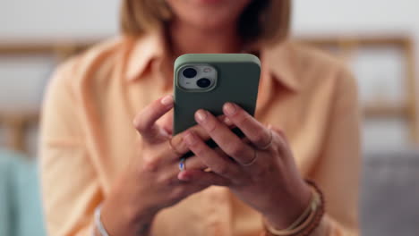 Woman,-hands-and-phone-on-sofa-for-social-media