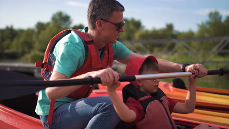 father and son kayaking