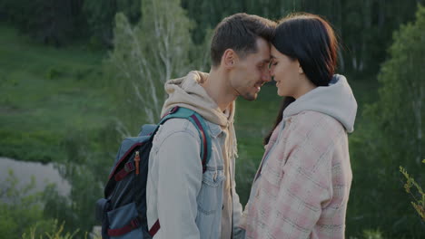 couple kissing in nature