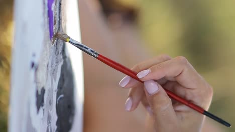 talented african american female artist creating masterpiece, painting picture on canvas. - talented african american female artist creating masterpiece, painting picture on canvas in art studio