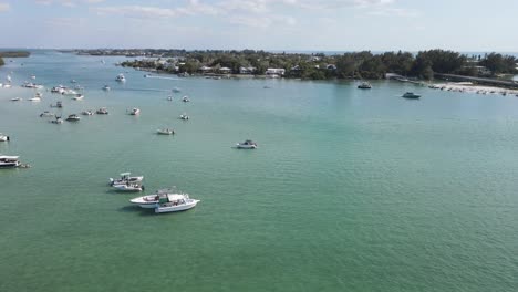 aerial, sandbar social, boaters in sarasota, florida relax near jewfish key