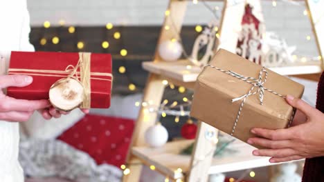 couple exchanging their christmas presents