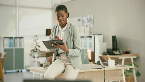 businesswoman working on tablet in office