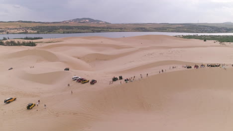 mui ne white sand dunes vietnam lineup of 4wd and quad bike acivities