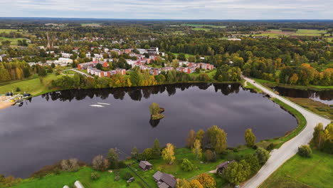 scenic lakefront town near mālpils in sigulda municipality, vidzeme region of latvia. aerial drone shot