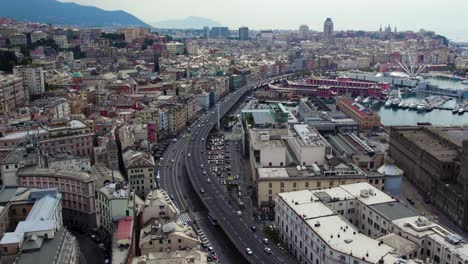 Vista-De-Drones-Del-Paisaje-Urbano-De-La-Ciudad-Metropolitana-De-Génova,-Importante-Puerto-Marítimo-Mediterráneo