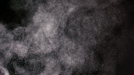 powder isolated on black background