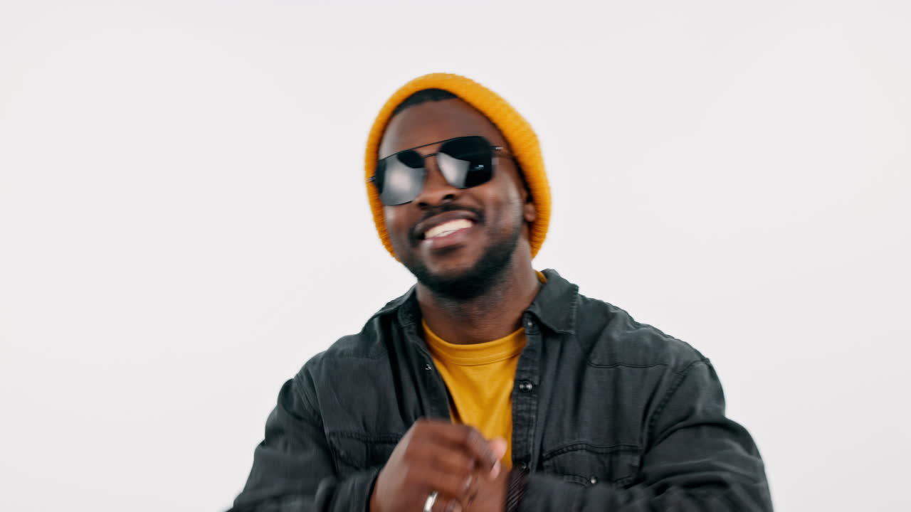 Happy, man and dance with fashion in studio to