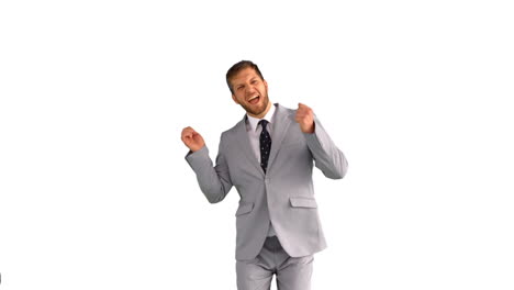 Businessman-dancing-and-smiling-on-white-background