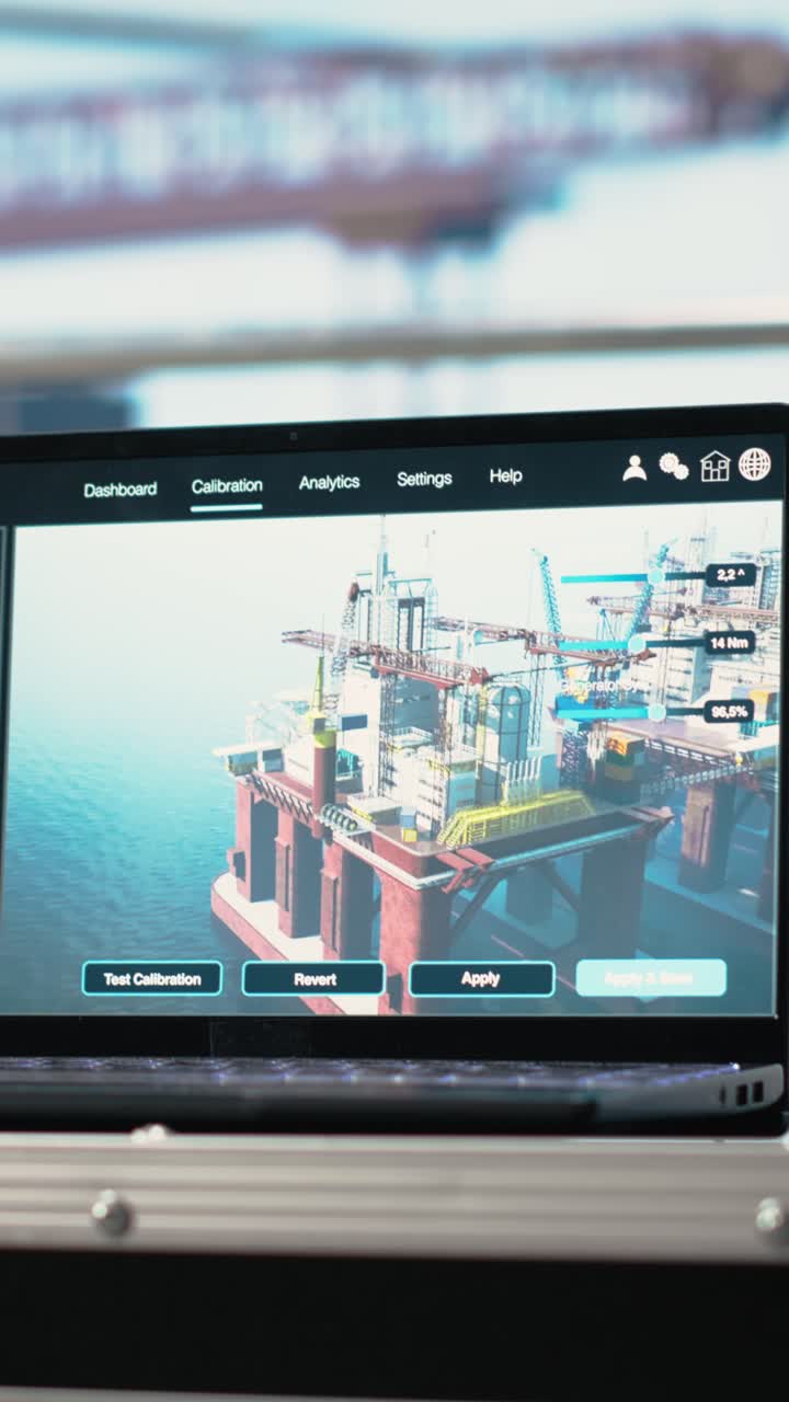 Vertical video Laptop on drilling rig ship with dashboard monitoring operation performance