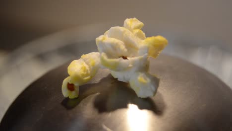 close up shot of rotating one pop corn - close up, macro