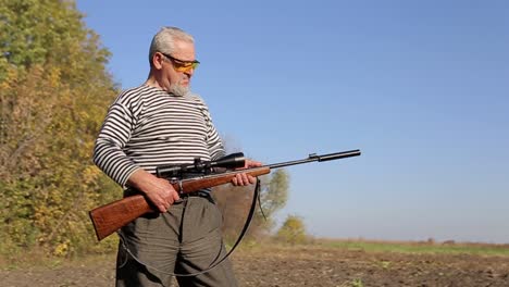hunter aiming for a rifle a sniper hunter aiming for a rifle a sniper