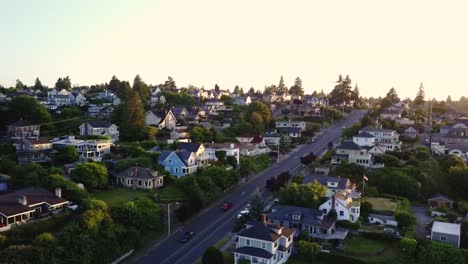 flying over a quiet neighborhood in tacoma, washington during sunset - aerial