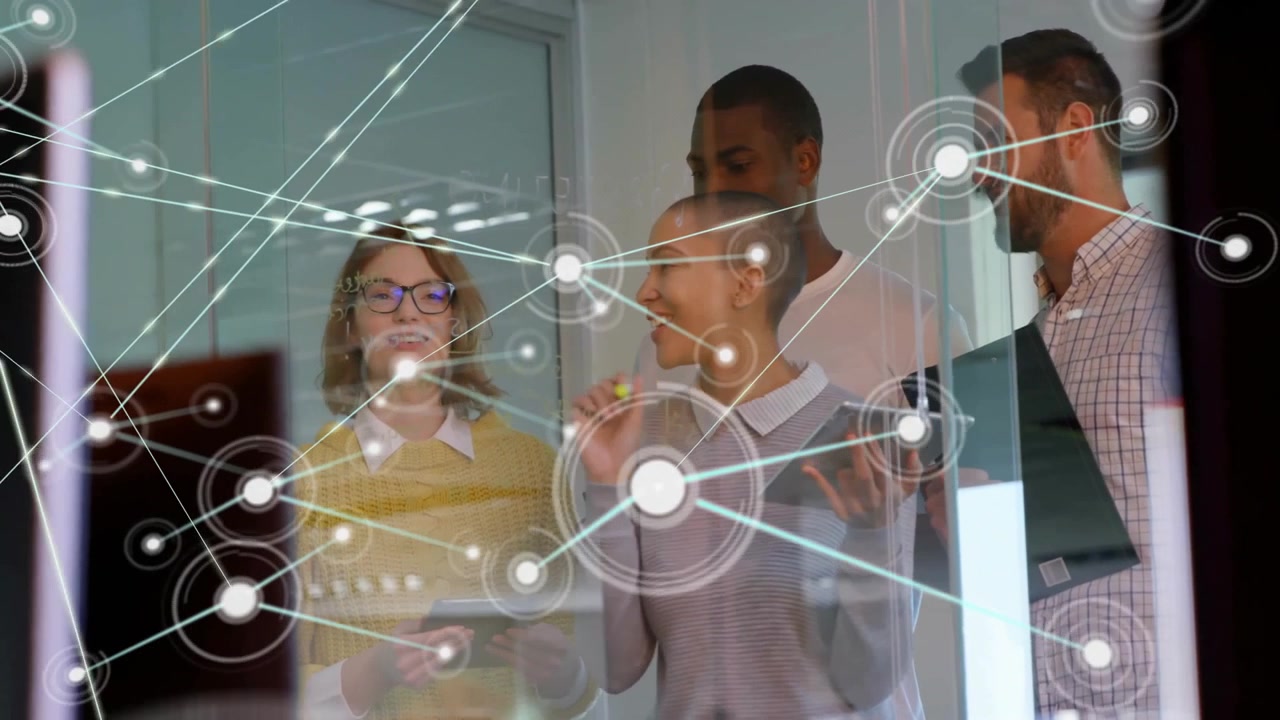 Business team standing behind glass wall, collaborating on glowing network diagram with data nodes