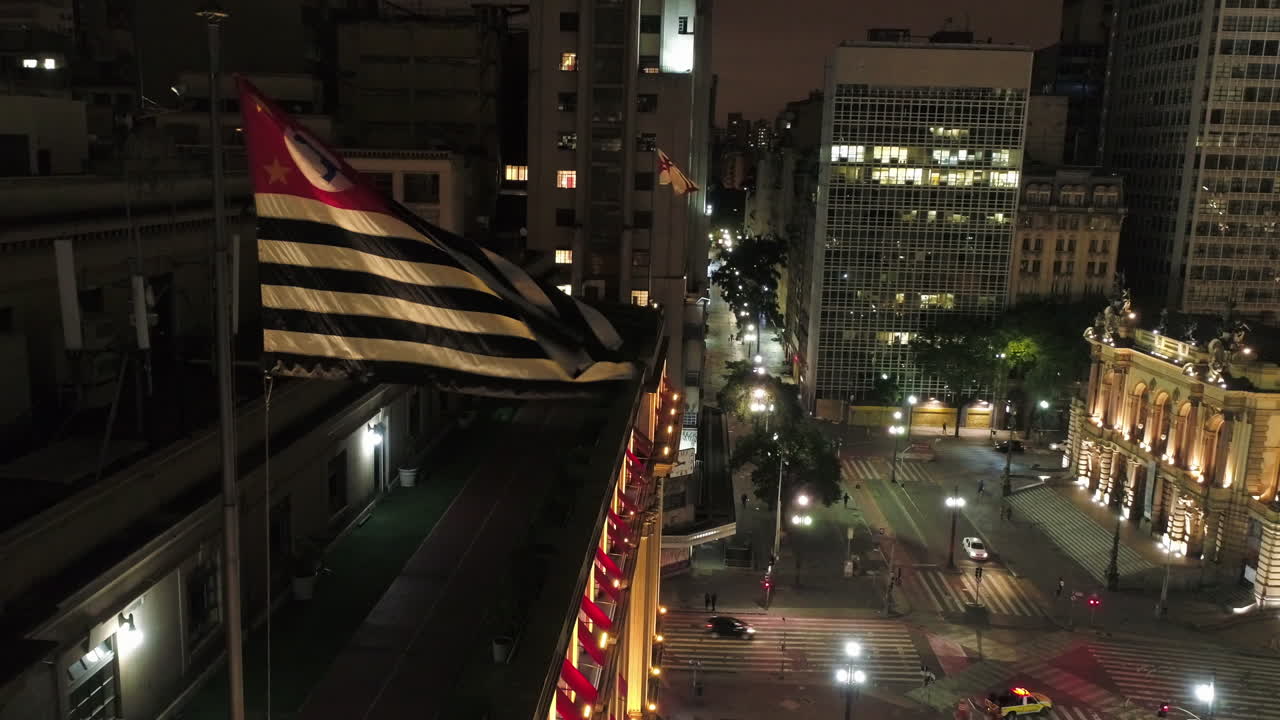 Aerial view of Municipal Theater with a flag fluttering, Sao Paulo downtown, Brazil
