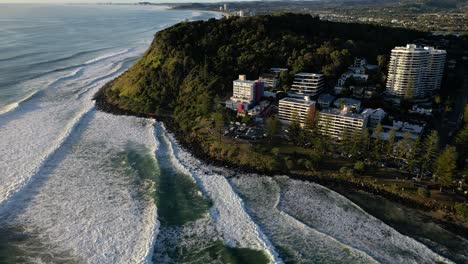 High,-left-to-right-aerial-over-Burleigh-Heads,-Gold-Coast,-Australia