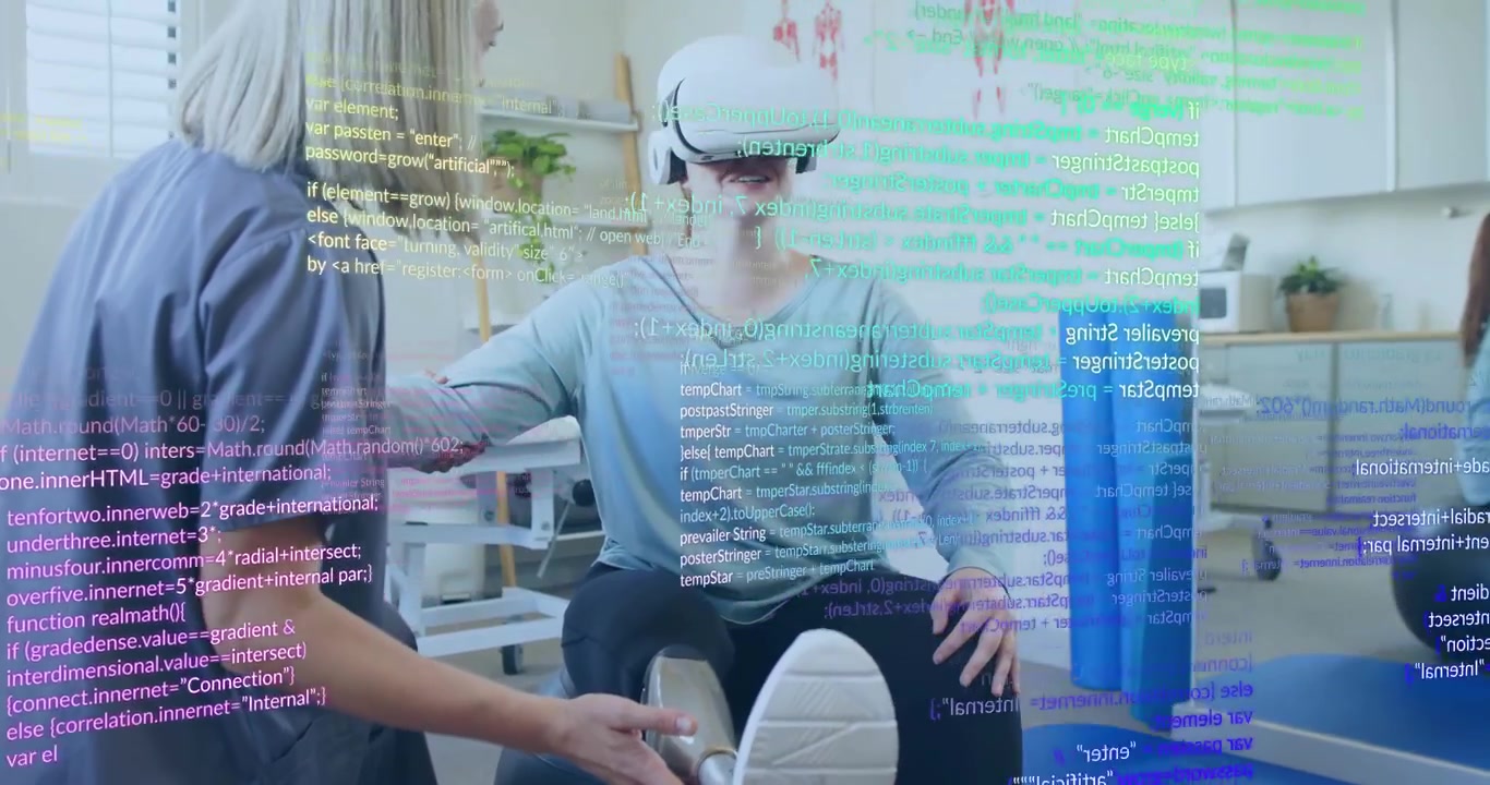 Patient sitting on gym ball, therapist checking prosthetic alignment and patient donning VR headset